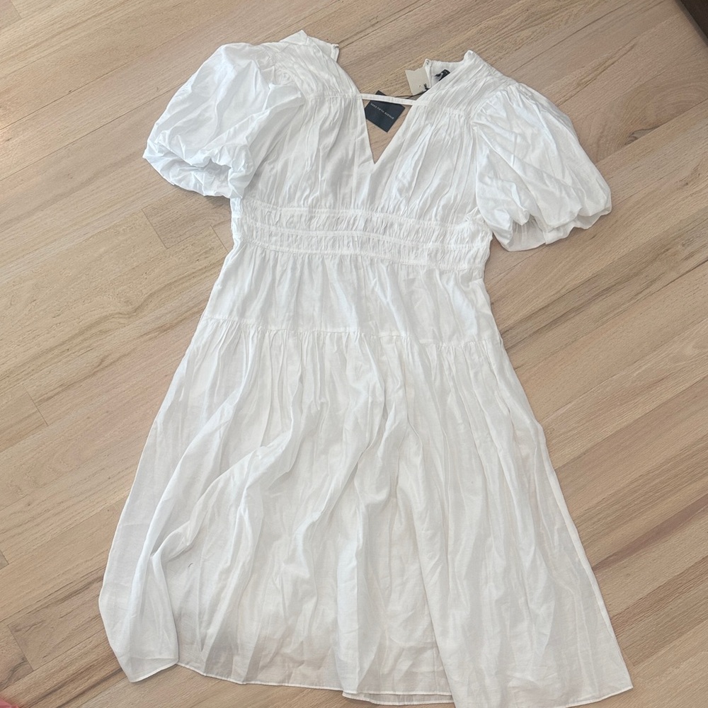 Saks White Puff Sleeve V-Neck Smocked Waist Mini Dress